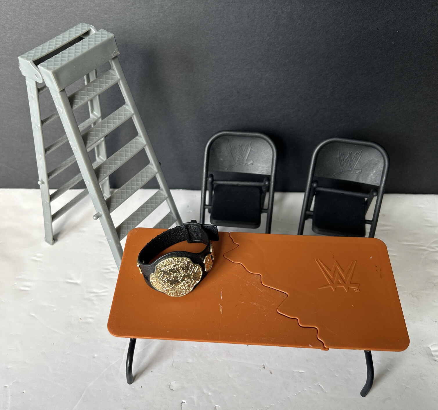 Lot of Five WWE Ring Accessories Breakaway Table, 2 Chairs, Ladder