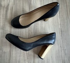 Kate Spade Leslie round toe gold heel pumps in a 8