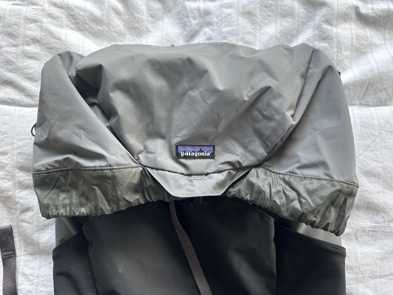 Two Patagonia backpacks + One LowePro waist pack = 3 packs in all!