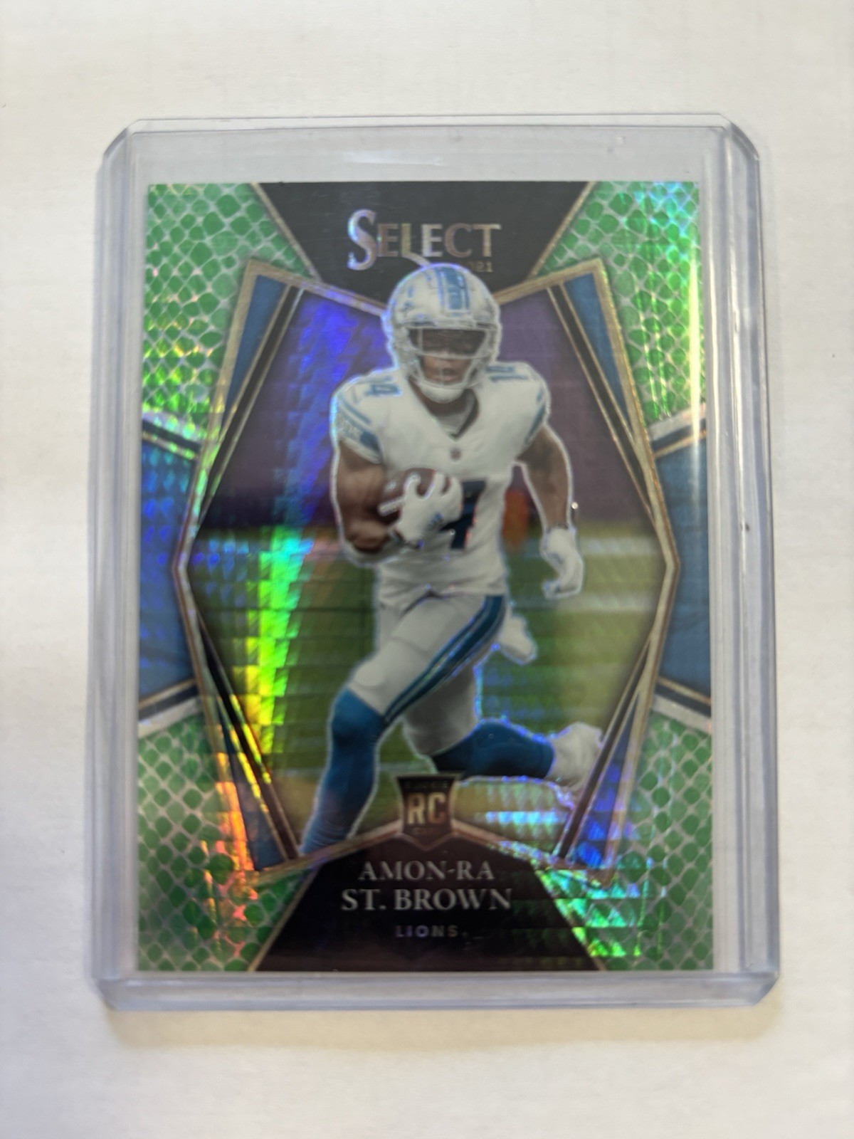 2021 Panini Select - Premier Level Amon-Ra St. Brown Dragon Scale Prizm /89 (RC)