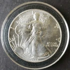 1986 $1 American Silver Eagle Dollar in a Capsule