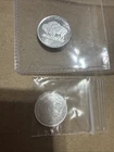 Two 1/10 Oz Silver Rounds