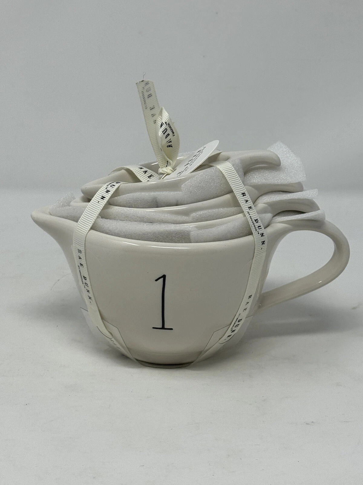 Rae Dunn White Tea Cup Measuring Cups With Cute Handle 4 Piece Set NWT ceramic