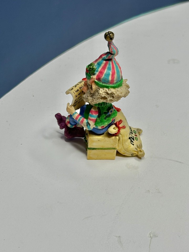 Enesco The North Pole Village Munchie Santa Elf Reading a Letter to