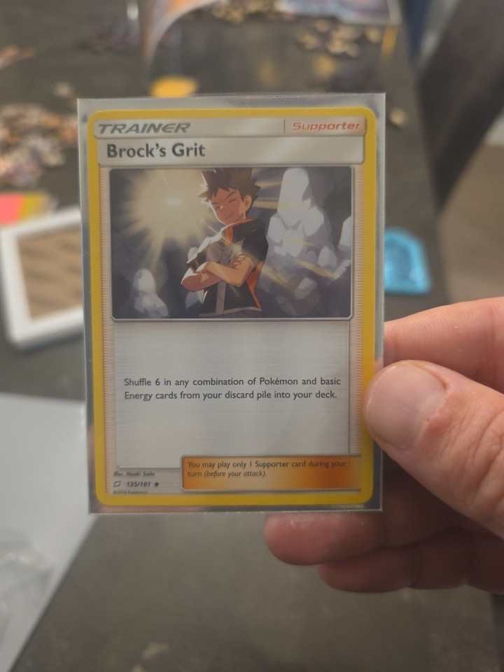 Brock's Grit 135/181 Sm-Team Up Regular - Pokemon Card
