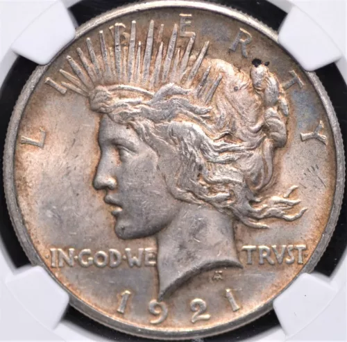1921 PEACE DOLLAR HIGH RELIEF NGC MS 62 SILVERY GREY WITH A DUSTING OF WHEAT 