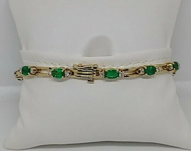 BRAZALETE ORO AMARILLO 14KT 5.7CTW ESMERALDA NATURAL Y DIAMANTES GENUINOS 0.66CTW 7.5" Foto 3 de 4