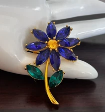JJ Flower Brooch Indigo Blue Petals & Green Leaves Gold Tone Prong Set Signed