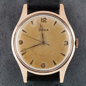 doxa 14k gold