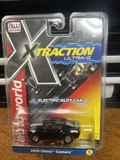 Autoworld HO Slot Car -X TRACTION 2010 Chevy Camaro BLACK W/DUAL SILVER STRIPES