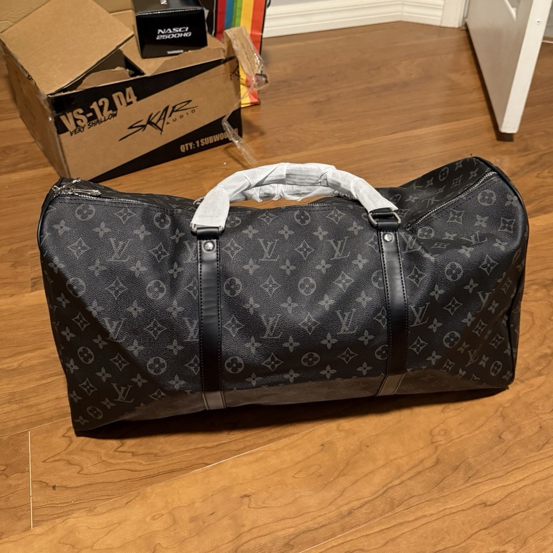 Louis Vuitton Monogram Duffle Bag Top Zip Handles Adjustable Shoulder Strap