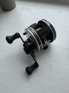 abu garcia ambassadeur reels by year Pro Rocket 6500 100 Anniversary Reel Gear Ratio:6.2:1 subcategory:Baitcast_Combos Abu Garcia Max X shaped side cup that