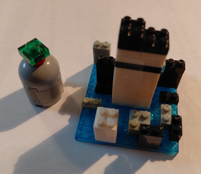Mini lego building blocks on small 1.5" square base. 40 blocks. Gray, white, blk