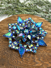 Gorgeous vintage aurora borealis teal/blue, star flower rhinestone brooch