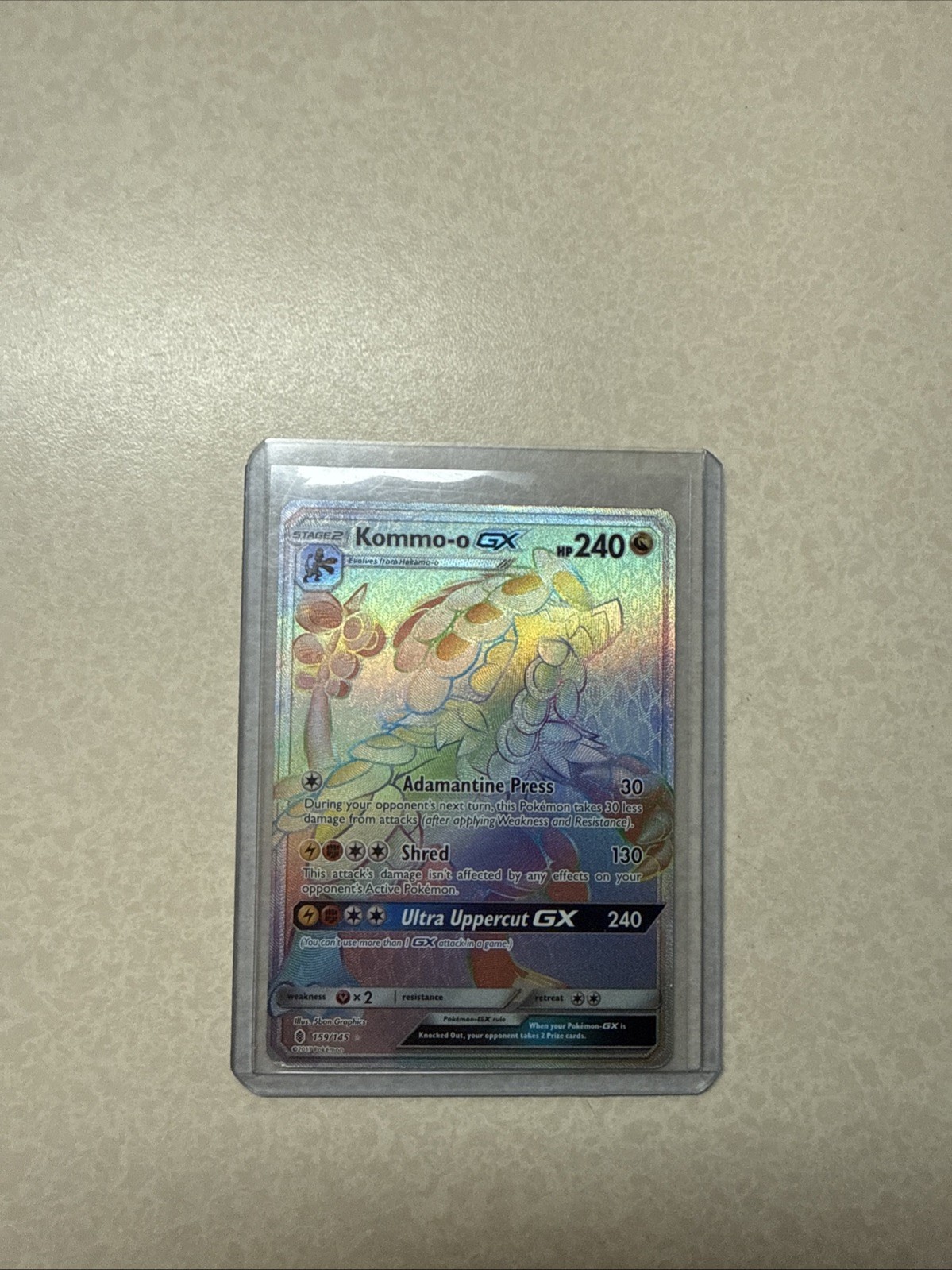 Kommo-o GX (Secret) 159/145 Sm-Guardians Rising Holo