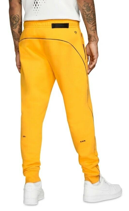 SOLD OUT!! NIKE X DRAKE NOCTA ESSENTIALS FLEECE PANT UNIVERSITY GOLD  DA3934-739