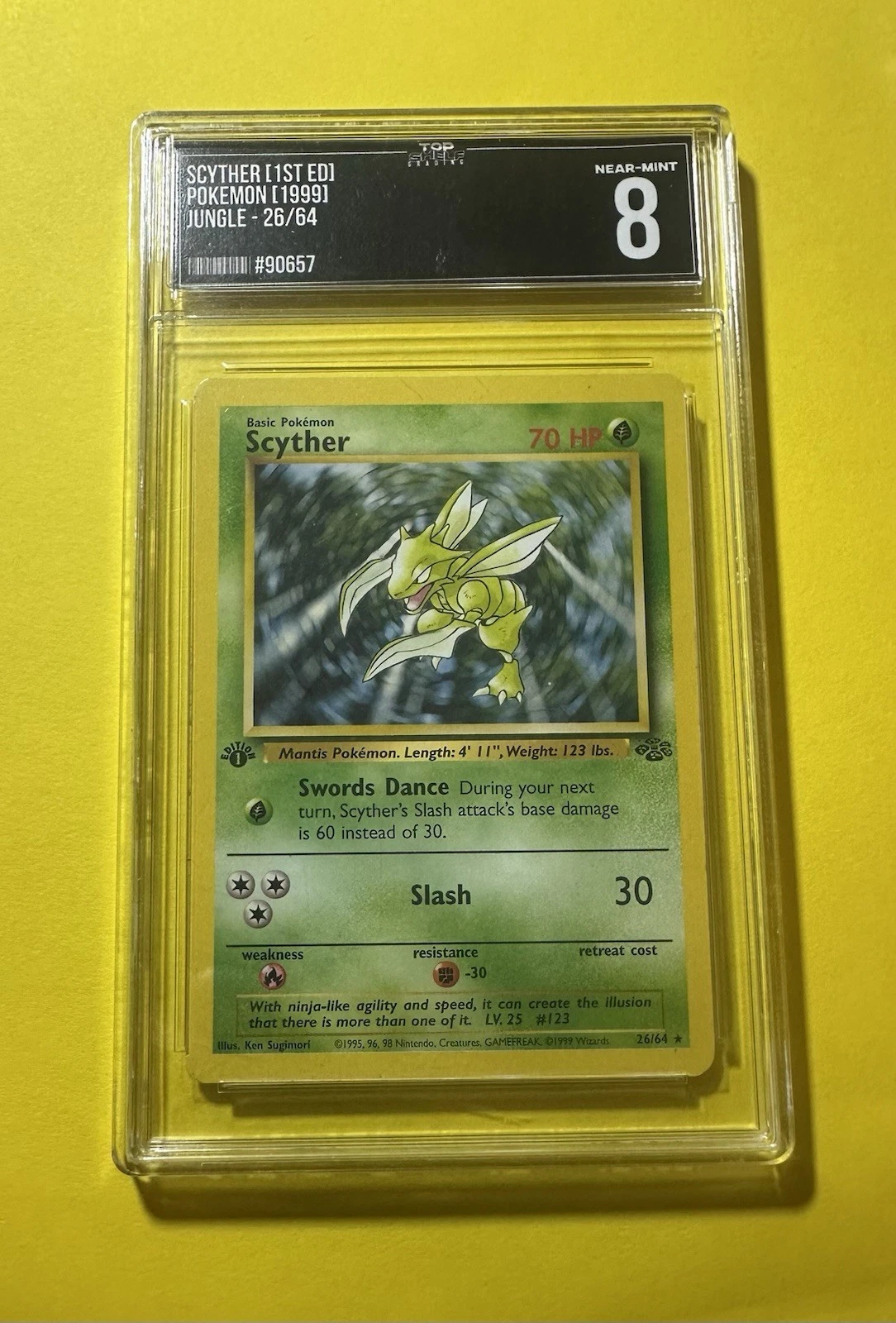 1st Edition Scyther 26/64 Jungle Regular Grade 8 Near-Mint