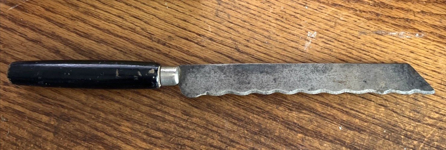 Vintage Bread or Cake Knife Serrated 8 1/2" Carbon Steel Blade Wooden Handle
Opens in a new window o