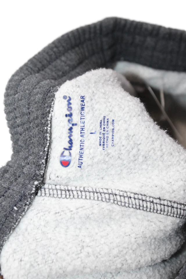 Pantalones de chándal Champion grises con logotipo atlético de pierna cónica para niños talla L Foto 3 de 4