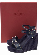 Valentino Garavani Rockstud Studded Wedge Str...