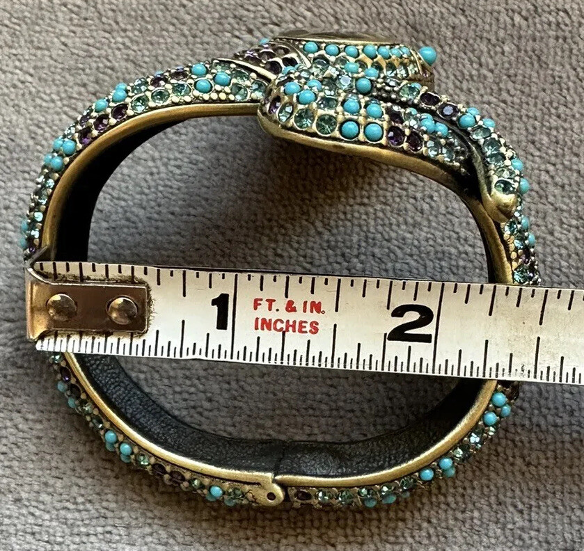 Heidi Daus toruqouise rhinestone clamper snake watch