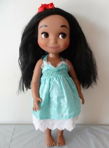 it's a small world hawaiian doll