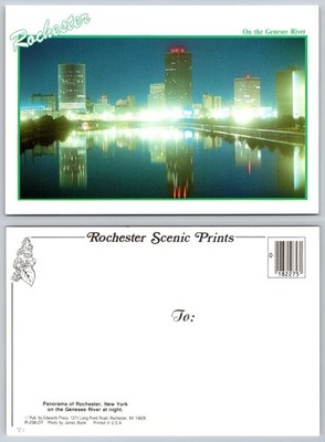 Rochester NY Night Skyline Genesee River Reflection Postcard Edwards Press 1988