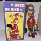 Key Wind-up Tin Toy Blechspielzeug BLIC Circus Duck Bike Tricycle works In Box — photo 1