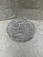 vintage cut glass or crystal shallow dish with toothed rim