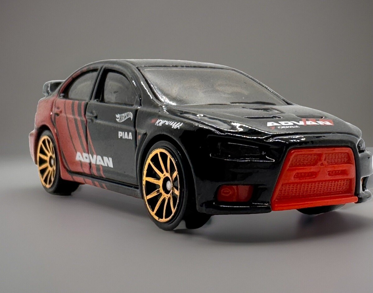 Hot Wheels Speed Graphics - 2008 Lancer Evolution Die-Cast Model