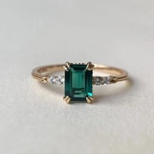 2Ct Emerald Cut Simulated Emerald Women's Wedding Ring In 14K Yellow Gold Plated