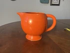 Vintage Fiestaware Orange Ice Lip Pitcher in Orange-red