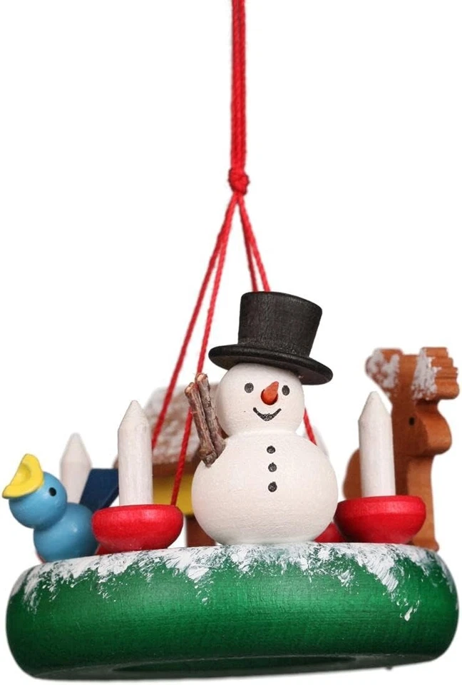 Corona decorativa Alexander Taron con adorno de muñeco de nieve de Navidad Foto 2 de 2