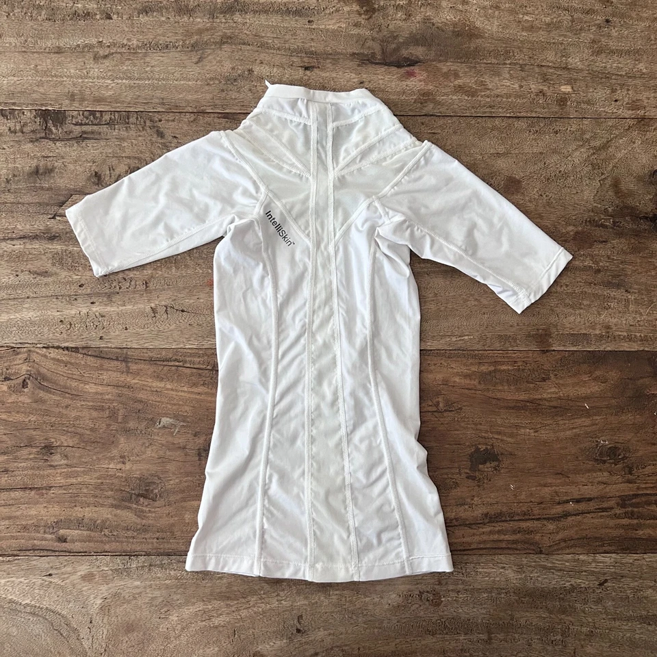 Camiseta Usada en Excelente Condición IntelliSkin BLANCA Manga Corta Asistencia de Postura Correcta Para Mujer Talla XS Foto 3 de 4