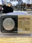 2004 SILVER AMERICAN EAGLE  1 OZ  FINE SILVER LITTLETON HOLDER