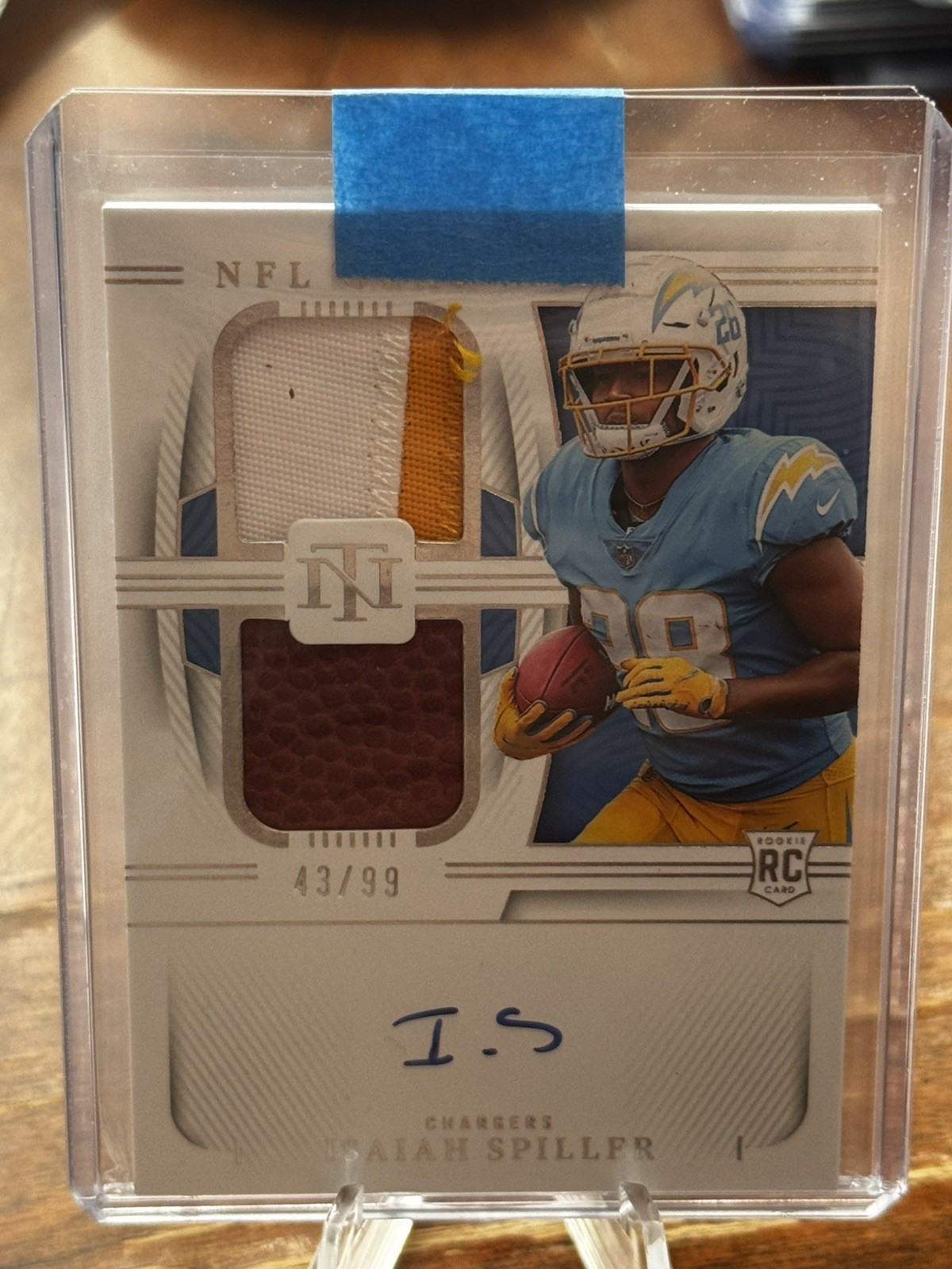 Isaiah Spiller Panini National Treasures Crossover Rookie Patch Autograph #IS Base