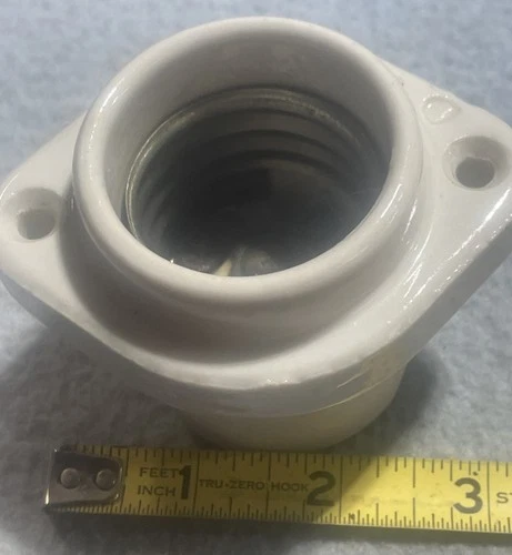 Porcelain Mogul Base Socket 2-1/8” Diameter   2 3 3/4” Between Mtg Holes