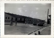 WW2 Photo of Soldiers Marching Along Road by Barracks