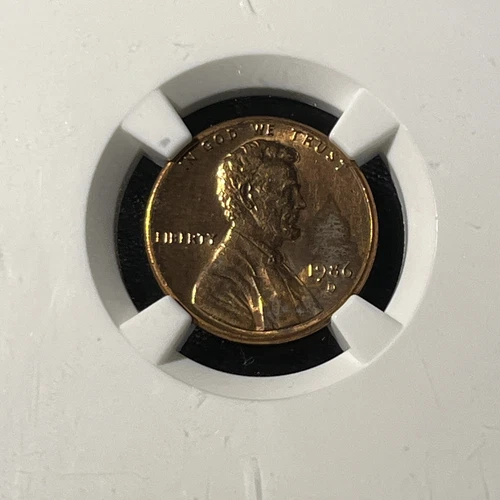 1986 D 1C NGC UNC DETAILS POLISHED. CORRODED