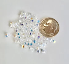 100 pc SWAROVSKI CRYSTAL AB CLEAR 3mm LOOSE BEADS BICONES 5328 BRIDAL Free Ship