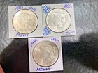 (3)  1 LOT Peace Silver Dollars. UNC Blast White. 1922,1923,1924 LESS THAN MELT!