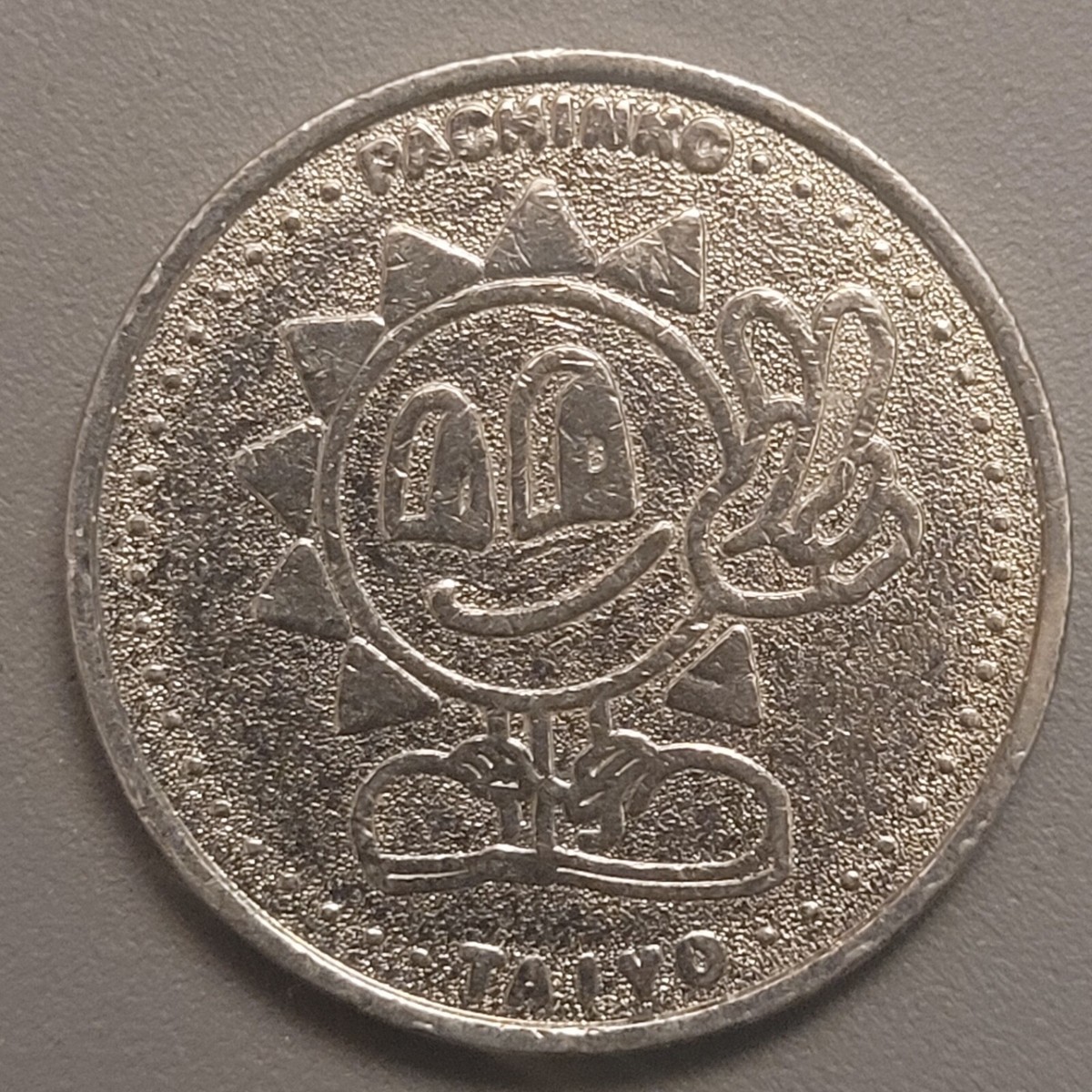 Vintage Taiyo Pachinko Metal Token - Fun Sun Character | eBay
