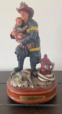 Van mark “hero” special edition music box firefighter figure