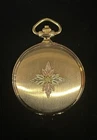 Vintage landstorms pulsar black hills gold pocket watch Runs!  (10k Logo)