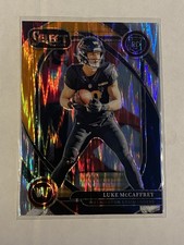 2024 Select - Club Level Luke McCaffrey #279 Black & Orange Shock Prizm (RC)