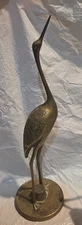 two brass stork figurines  ch