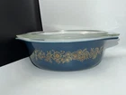 Vintage Pyrex "Golden Bouquet" 1.5-quart casserole dish.