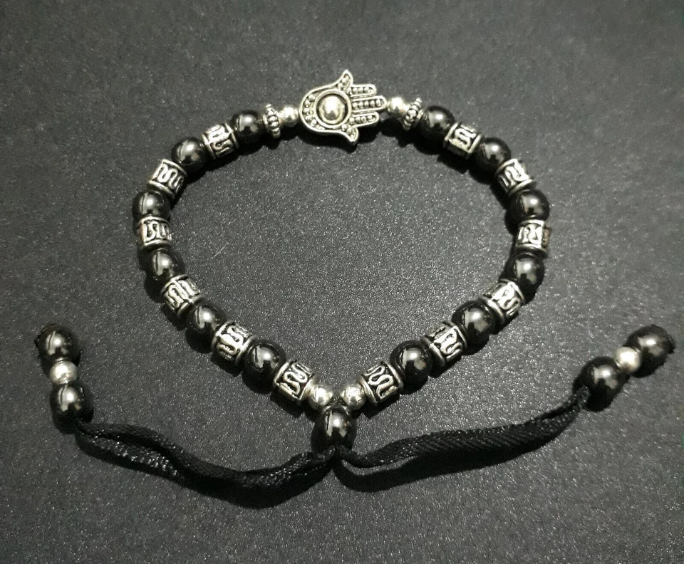 Bracciale Hamsa Hand Evil Eye Ematite Cordoncino metallico Fatto a mano in... - Immagine 3 di 4