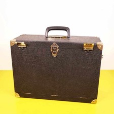 Elegante valigia vintage in pelle nera