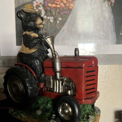Bear On Tractor Resign